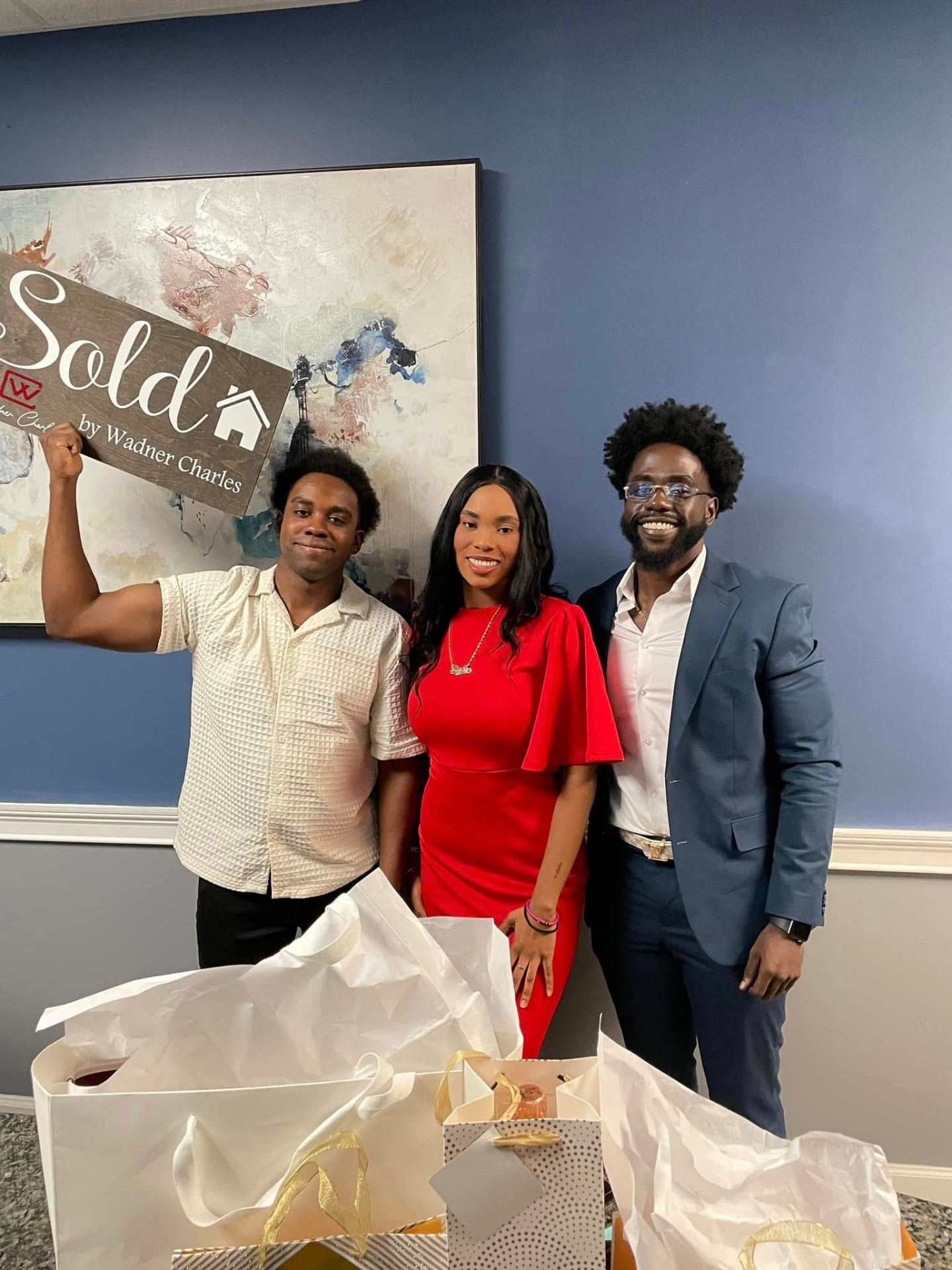 Wadner Charles with his clients at closing in Eagle Trace — Coral Springs, FL